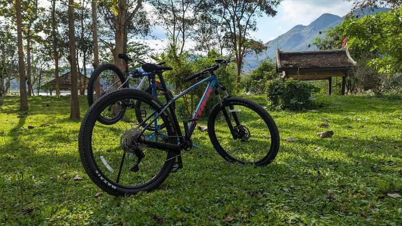 From Luang Prabang: Guided Mountain Bike Tour with Lunch - Time, transport, and group arrangements