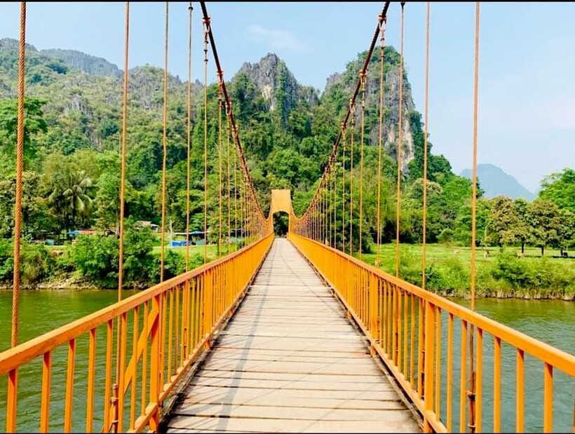 From Vientiane: Vang Vieng Tour with Cave Kayak & Zipline - Wat Kang adds a cultural stop