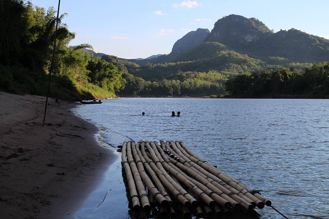 FULL DAY – Kuang Si Waterfall, Kayak on the Nam Ou / Mekong River, Pak Ou Caves - Whisky Village and the road to Kuang Si