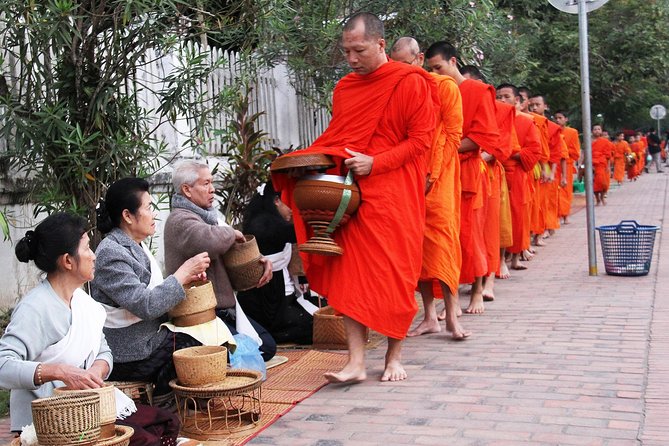 Luang Prabang Early Morning Alms Giving and Wet Market - The wet market after the monks pass
