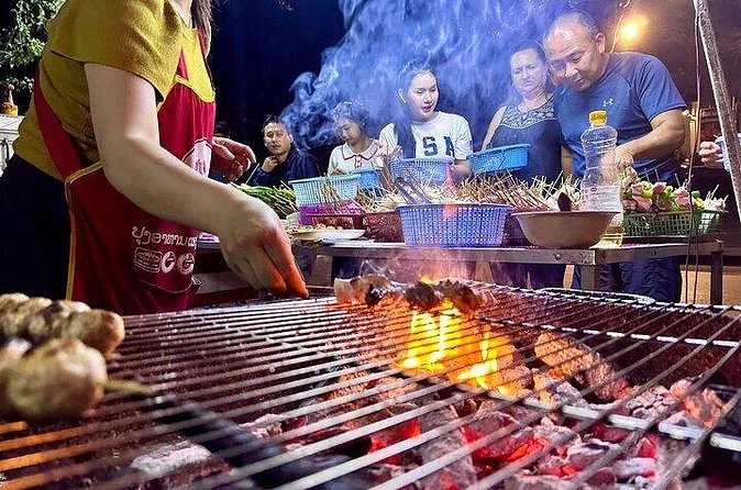Luang Prabang Evening Food Tour by Tuk-Tuk - Hot pot, Lao BBQ, and the main meal