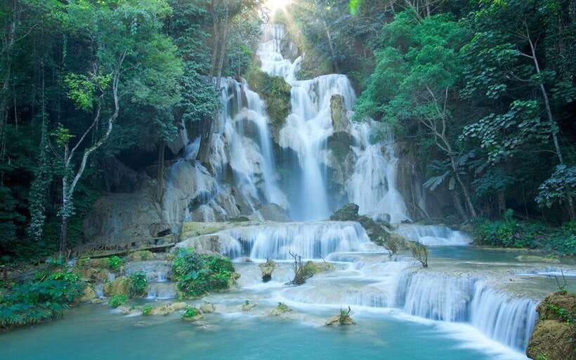 Luang Prabang: Kuang Si Bike Ride & Long-Tail Boat Cruise - Cycling out of Luang Prabang on paved roads