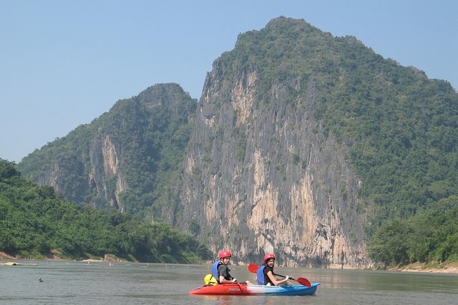 Luang Prabang Mountain Bike Cycling Tour - Villages, rice fields, and the first stop at Pak Ou