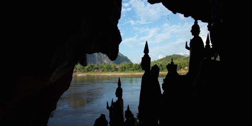 Luang Prabang: Pak Ou Caves & Kuang Si Falls Day Trip - The upper cave, stairs, and a flashlight