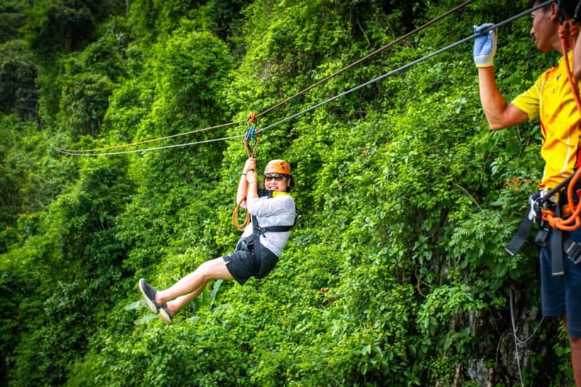 Vang Vieng: Day Tour with Kayaking, Ziplining, and Rafting - Floating through Tham Chang Cave