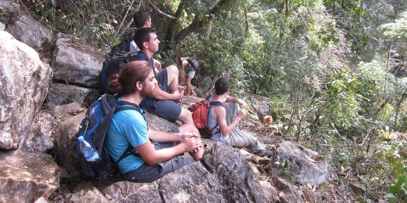 Vang Vieng: Jungle & Caves Full-Day Private Trekking Tour - Descending to Secret Eden
