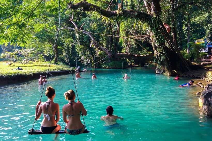 Vang Vieng: Kayaking & Cave Tubing with Zip Line/Blue Lagoon - Tham Nam None and the wartime story