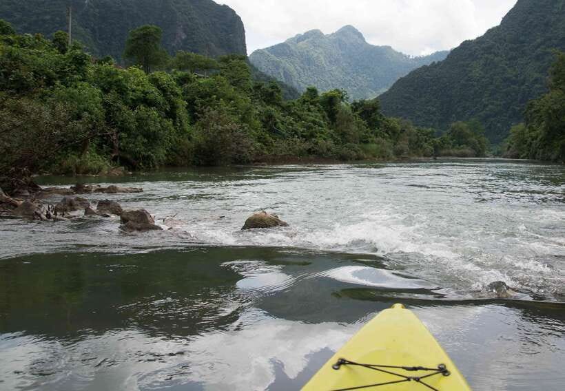 Vang Vieng: Nam Song River Kayak Tour - Paddling through small rapids and mountain views