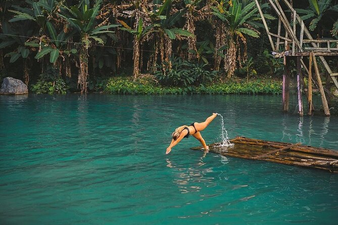 Vang Vieng Tour A Blue lagoon 3 with Caves and Zipline - Ziplining begins at a treehouse